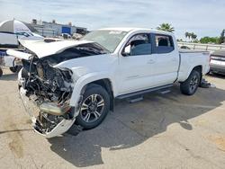Salvage cars for sale from Copart Bakersfield, CA: 2017 Toyota Tacoma TRD Sport