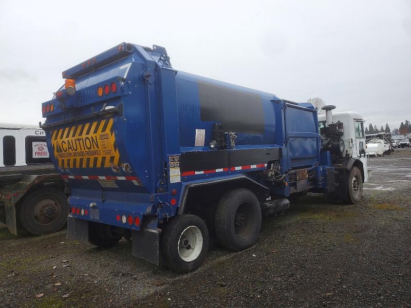 2013 Peterbilt 320 Refuse Truck