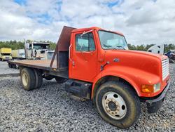 International salvage cars for sale: 1999 International 4700 Flatbed Truck