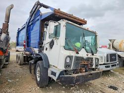 Salvage trucks for sale at Grand Prairie, TX auction: 2014 Mack MRU600 Refuse Truck