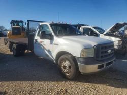 Salvage trucks for sale at Wilmer, TX auction: 2006 Ford F350 Super Duty Flatbed Truck