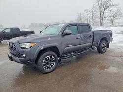 Salvage trucks for sale at Central Square, NY auction: 2023 Toyota Tacoma TRD Sport