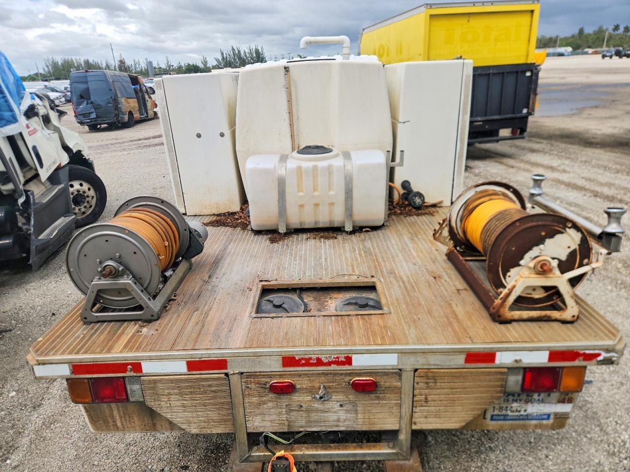 2011 Isuzu NPR HD Flatbed Truck