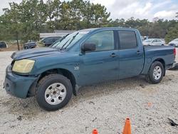 Salvage trucks for sale at Houston, TX auction: 2004 Nissan Titan XE