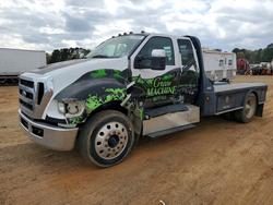 2009 Ford F650 Super Duty Flatbed Truck en venta en Longview, TX