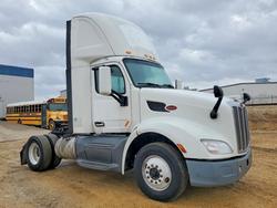 Salvage cars for sale from Copart Eldridge, IA: 2016 Peterbilt 579 Semi Truck
