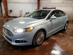 2014 Ford Fusion Titanium hev en venta en Lansing, MI