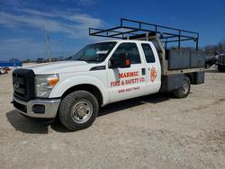 Salvage trucks for sale at Rogersville, MO auction: 2014 Ford F350 Super Duty Flatbed Truck