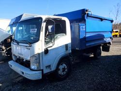 Salvage trucks for sale at Marlboro, NY auction: 2014 Isuzu NPR HD Refuse Truck
