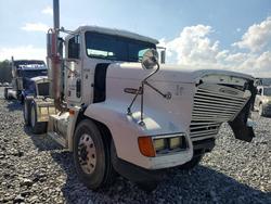 Salvage trucks for sale at Cartersville, GA auction: 2000 Freightliner Conventional FLD120 Semi Truck
