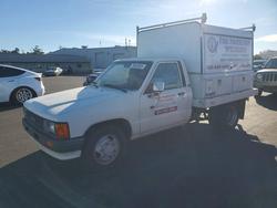 Salvage trucks for sale at Martinez, CA auction: 1988 Toyota Pickup Utility / Service Truck