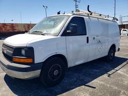 Salvage cars for sale from Copart Wilmington, CA: 2014 Chev Express G2500 4LT