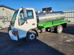 Salvage trucks for sale at Airway Heights, WA auction: 1999 Isuzu NPR