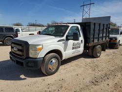 Salvage trucks for sale at Oklahoma City, OK auction: 2011 Ford F350 Super Duty Flatbed Truck