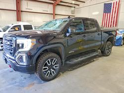 GMC salvage cars for sale: 2021 GMC Sierra K1500 AT4