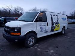 Salvage trucks for sale at Marlboro, NY auction: 2014 Chev Rolet Express 2500 Cargo Utility / Service Van