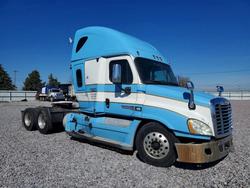 Salvage trucks for sale at Eldridge, IA auction: 2013 Freightliner Cascadia Semi Truck