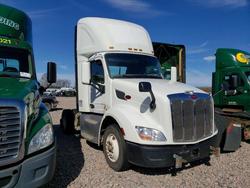 Salvage cars for sale from Copart Avon, MN: 2017 Peterbilt 579 Semi Truck