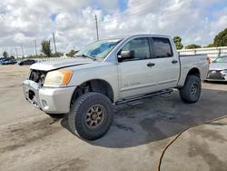 Salvage cars for sale from Copart Miami, FL: 2010 Nissan Titan SE