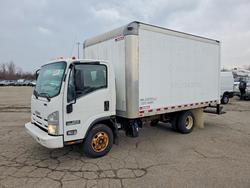 Salvage trucks for sale at Woodhaven, MI auction: 2014 Isuzu NPR BOX Truck