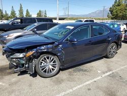 Salvage cars for sale from Copart Rancho Cucamonga, CA: 2022 Toyota Camry XLE