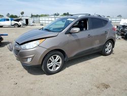 Salvage cars for sale from Copart Bakersfield, CA: 2013 Hyundai Tucson GLS