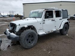 Salvage cars for sale from Copart Rocky View County, AB: 2013 Jeep Wrangler Unlimited Sahara