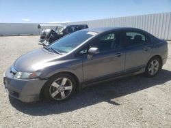 Salvage cars for sale from Copart Adelanto, CA: 2011 Honda Civic LX-S