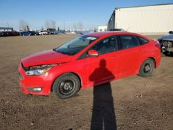 Salvage cars for sale from Copart Rocky View County, AB: 2015 Ford Focus SE