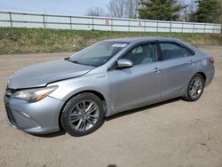 Salvage cars for sale from Copart Davison, MI: 2016 Toyota Camry Hybrid