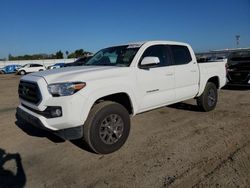 Salvage cars for sale from Copart Bakersfield, CA: 2021 Toyota Tacoma Double Cab