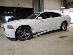 Salvage cars for sale from Copart Eldridge, IA: 2013 Dodge Charger V6