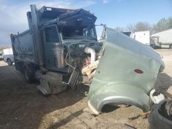 Salvage trucks for sale at Kansas City, KS auction: 2014 Peterbilt 388 Dump Truck