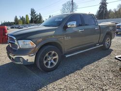 Salvage trucks for sale at Graham, WA auction: 2013 Dodge 1500 Laramie