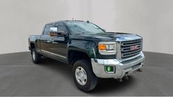 Salvage trucks for sale at North Billerica, MA auction: 2015 GMC Sierra K2500 SLT