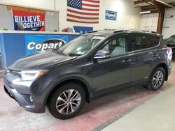 Salvage cars for sale from Copart Angola, NY: 2018 Toyota Rav4 HV LE