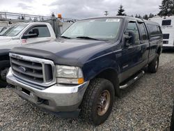 Salvage trucks for sale at Graham, WA auction: 2004 Ford F350 SRW Super Duty