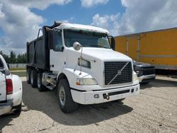 Salvage trucks for sale at Arcadia, FL auction: 2013 Volvo VNM Dump Truck