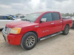 Salvage trucks for sale at Houston, TX auction: 2011 Nissan Titan SV