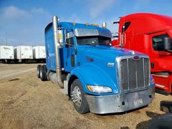 Salvage trucks for sale at Cedar Rapids, IA auction: 2008 Peterbilt 386 Semi Truck