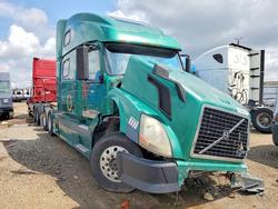 Salvage trucks for sale at Elgin, IL auction: 2006 Volvo VN VNL-Semi Truck