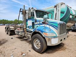 Salvage trucks for sale at Charles City, VA auction: 2022 Peterbilt 348 ROLL-OFF Container Truck
