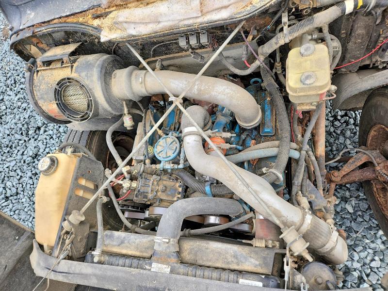 1999 International 4700 Spreader Truck