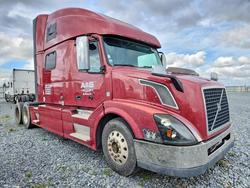 Salvage trucks for sale at Fresno, CA auction: 2015 Volv O VNL Semi Truck