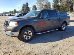 Salvage trucks for sale at Spanaway, WA auction: 2005 Ford F150 Supercrew