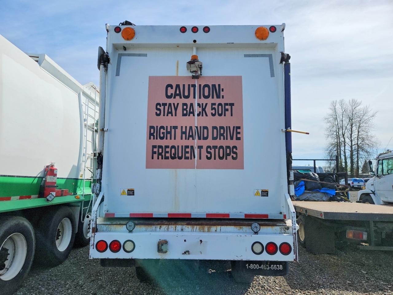 2003 Freightliner FL70 Refuse Truck