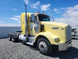 Salvage trucks for sale at Brighton, CO auction: 1999 Kenworth Constructi-Semi Truck
