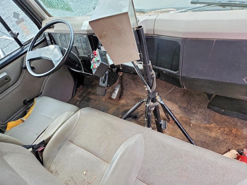 1999 International 4700 Spreader Truck