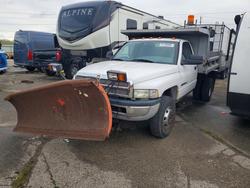 Salvage trucks for sale at Woodhaven, MI auction: 2002 Dodge RAM 3500