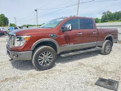 Salvage trucks for sale at Grenada, MS auction: 2017 Nissan Titan XD Platinum Reserve